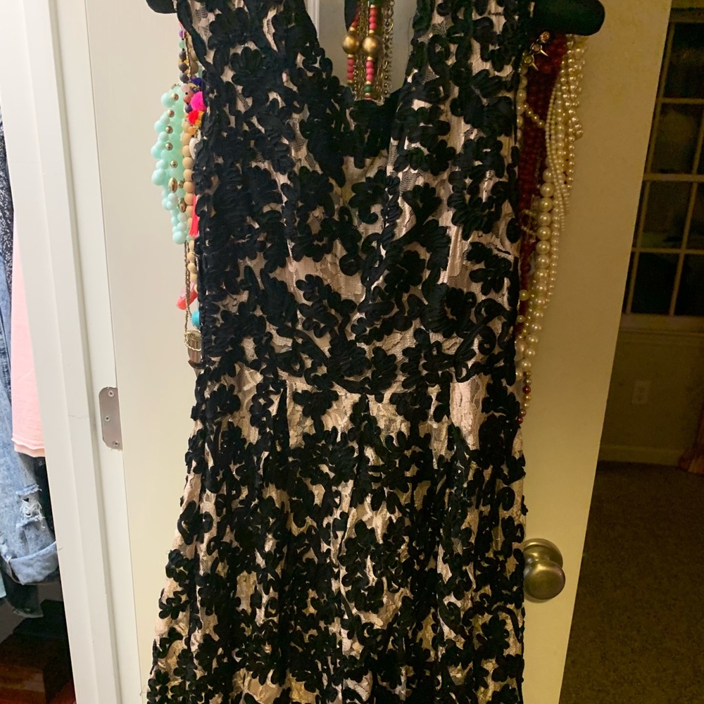 Black and cream lace dress